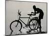 A Chadian Man Washes His Bicycle-null-Mounted Photographic Print
