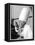 A Chef in a Chef's Hat Tastes Some Soup or Other Food from a Ladle-null-Framed Stretched Canvas