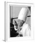 A Chef in a Chef's Hat Tastes Some Soup or Other Food from a Ladle-null-Framed Photographic Print
