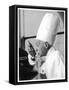 A Chef in a Chef's Hat Tastes Some Soup or Other Food from a Ladle-null-Framed Stretched Canvas