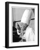 A Chef in a Chef's Hat Tastes Some Soup or Other Food from a Ladle-null-Framed Photographic Print