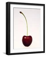 A Cherry Against a White Background-null-Framed Photographic Print