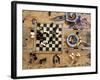 A Chess Board and Unemptied Ashtrays-null-Framed Photographic Print