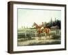 A Chestnut Racehorse with Jockey Up on a Training Track with Stables Beyond-Henry H. Cross-Framed Giclee Print