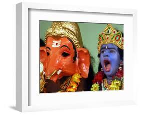 A Child Dressed as Hindu God Krishna Yawns, Chennai, India, September 22, 2006-M. Lakshman-Framed Photographic Print