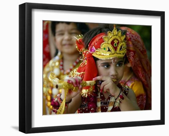 A Child Enacts the Life of Hindu God Krishna During Janamashtami Celebrations-null-Framed Premium Photographic Print