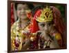 A Child Enacts the Life of Hindu God Krishna During Janamashtami Celebrations-null-Framed Photographic Print