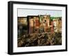 A Child Runs by a Row of Shacks in Novo Mundo Shantytown, Sao Paulo, Brazil-null-Framed Photographic Print