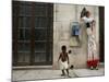 A Child Walks Past a Dancer of Giganteria's Group-null-Mounted Photographic Print