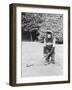 A Chimpanzee playing a round of golf-Staff-Framed Photographic Print