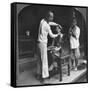 A Chinese Barber at Bhamo, Burma, 1908-null-Framed Stretched Canvas