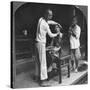 A Chinese Barber at Bhamo, Burma, 1908-null-Stretched Canvas