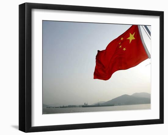 A Chinese Flag Flutters-null-Framed Photographic Print