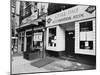 A Chinese Laundromat is Seen Next Door to the Offices of the Little Italy Restoration Association-null-Mounted Premium Photographic Print