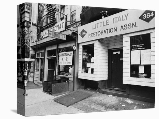 A Chinese Laundromat is Seen Next Door to the Offices of the Little Italy Restoration Association-null-Stretched Canvas