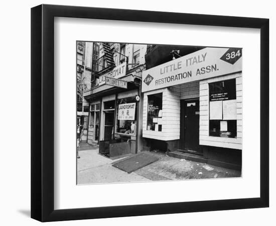 A Chinese Laundromat is Seen Next Door to the Offices of the Little Italy Restoration Association-null-Framed Photographic Print