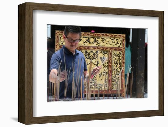 A Chinese man praying and offering incense, Thian Hock Keng Temple, Singapore-Godong-Framed Photographic Print