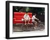 A Chinese Man Rides on a Sofa as Another Pedals a Delivery Tricycle-null-Framed Photographic Print