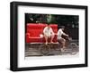 A Chinese Man Rides on a Sofa as Another Pedals a Delivery Tricycle-null-Framed Photographic Print