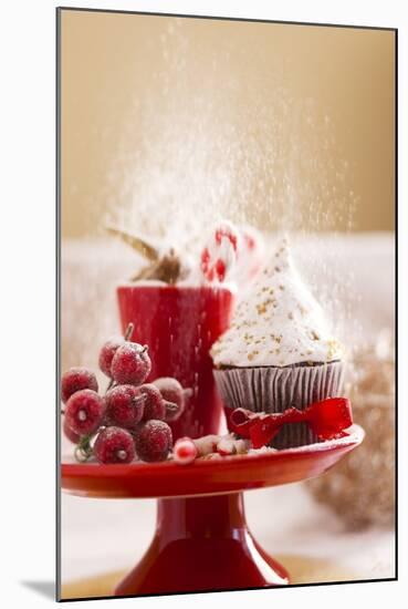 A Christmas Cupcakes in an Icing Sugar Snowstorm-Rogério Voltan-Mounted Photographic Print