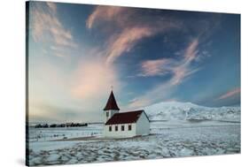 A church in the winter in western Iceland at sunset.-Alex Saberi-Stretched Canvas