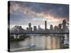 A Citycat Ferry Cruises Beneath Brisbane's Story Bridge Towards City Centre, Brisbane, Australia-Andrew Watson-Stretched Canvas