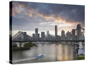 A Citycat Ferry Cruises Beneath Brisbane's Story Bridge Towards City Centre, Brisbane, Australia-Andrew Watson-Stretched Canvas