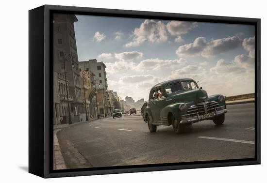 A classic Chevrolet car on the Malecon in Havana, Cuba.-Alex Saberi-Framed Stretched Canvas