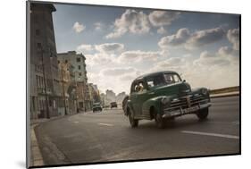 A classic Chevrolet car on the Malecon in Havana, Cuba.-Alex Saberi-Mounted Photographic Print