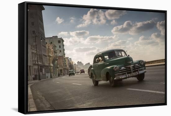 A classic Chevrolet car on the Malecon in Havana, Cuba.-Alex Saberi-Framed Stretched Canvas