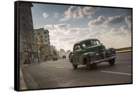 A classic Chevrolet car on the Malecon in Havana, Cuba.-Alex Saberi-Framed Stretched Canvas