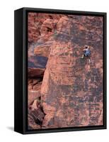 A Climber Ascends a Rock Face-null-Framed Stretched Canvas