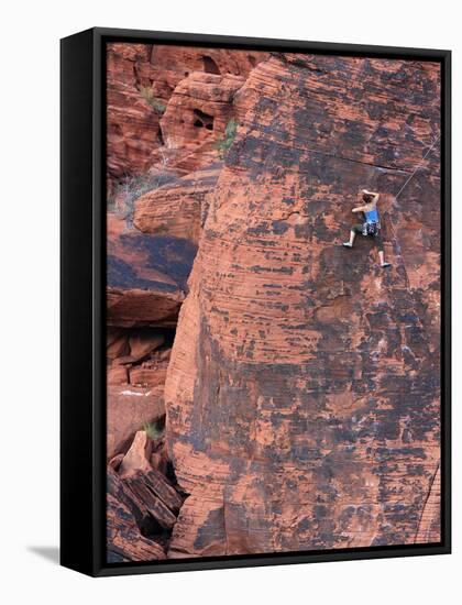 A Climber Ascends a Rock Face-null-Framed Stretched Canvas