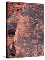 A Climber Ascends a Rock Face-null-Stretched Canvas