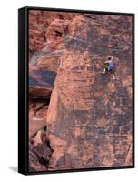 A Climber Ascends a Rock Face-null-Framed Stretched Canvas