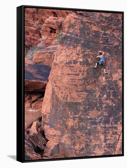 A Climber Ascends a Rock Face-null-Framed Stretched Canvas