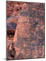 A Climber Ascends a Rock Face-null-Mounted Photographic Print