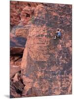 A Climber Ascends a Rock Face-null-Mounted Photographic Print