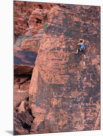A Climber Ascends a Rock Face-null-Mounted Photographic Print