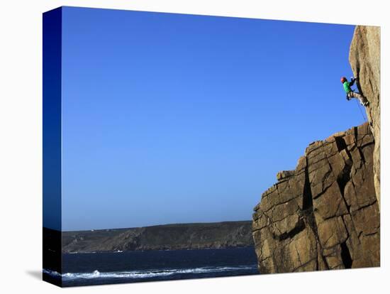 A Climber Tackles a Difficult Route on the Cliffs Near Sennen Cove, Cornwall, England-David Pickford-Stretched Canvas