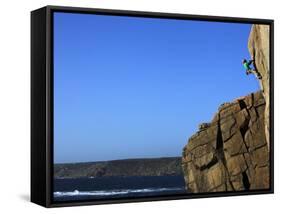 A Climber Tackles a Difficult Route on the Cliffs Near Sennen Cove, Cornwall, England-David Pickford-Framed Stretched Canvas