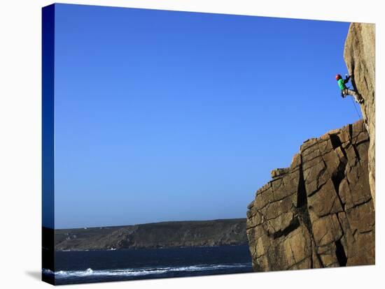 A Climber Tackles a Difficult Route on the Cliffs Near Sennen Cove, Cornwall, England-David Pickford-Stretched Canvas