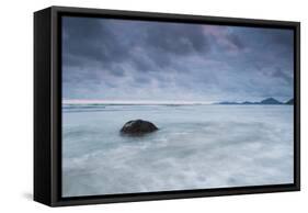 A cloudy but dramatic sunset on Itamambuca beach, Sao Paulo, Brazil.-Alex Saberi-Framed Stretched Canvas