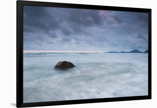 A cloudy but dramatic sunset on Itamambuca beach, Sao Paulo, Brazil.-Alex Saberi-Framed Photographic Print