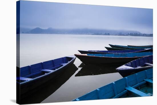 A Cold Front Brings a Low-Lying Fog Above Phewa Lake Next to Pokhara, Nepal-Sergio Ballivian-Stretched Canvas