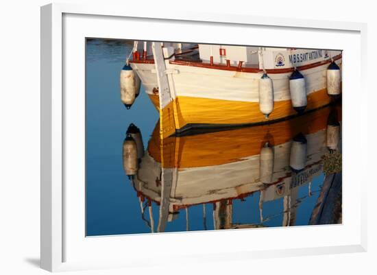 A Colorful Wooden Boat Reflected In The Calm Water Near Marsala, Sicily-Erik Kruthoff-Framed Photographic Print