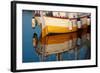 A Colorful Wooden Boat Reflected In The Calm Water Near Marsala, Sicily-Erik Kruthoff-Framed Photographic Print