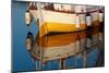 A Colorful Wooden Boat Reflected In The Calm Water Near Marsala, Sicily-Erik Kruthoff-Mounted Photographic Print