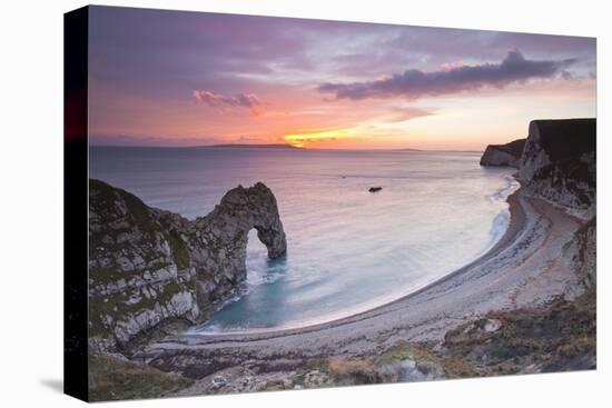 A Colourful Sunset over Durdle Door-Julian Elliott-Stretched Canvas