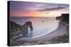 A Colourful Sunset over Durdle Door-Julian Elliott-Stretched Canvas